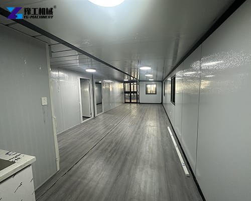 the space from kitchen to the door in the 2 bedroom prefab house